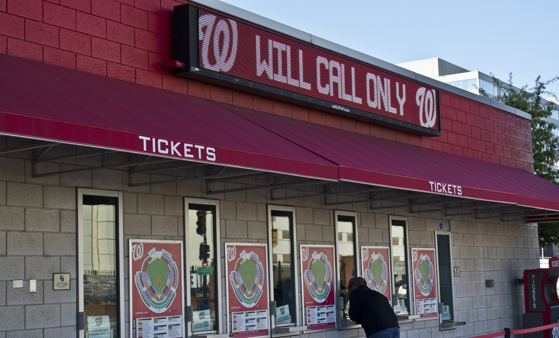 Box office ticket windows under a red awning with a Will Call Only sign